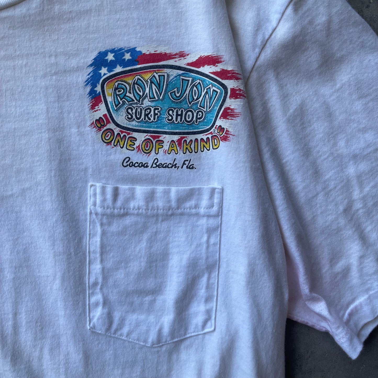 (XL) 90s Ron Jon Surf Shop “USA” Surfer Graphic Pocket Tee