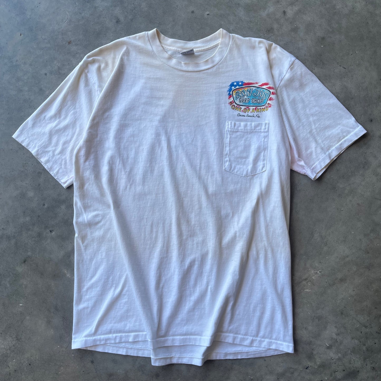 (XL) 90s Ron Jon Surf Shop “USA” Surfer Graphic Pocket Tee