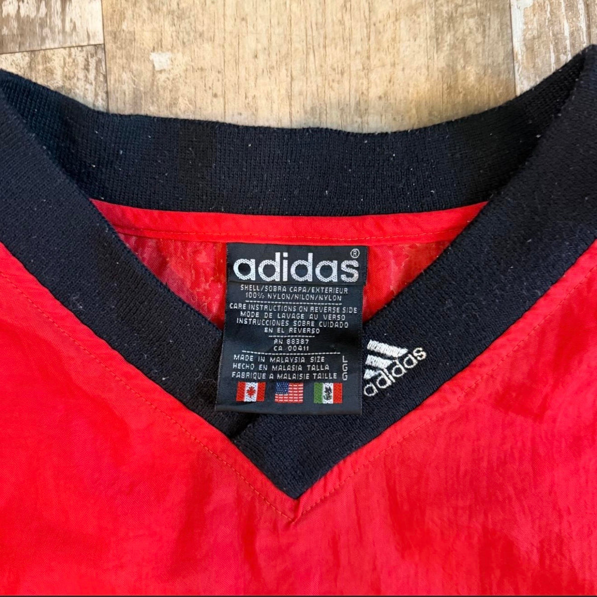 (L) Vintage 1990s Adidas Nebraska Football Pullover Windbreaker